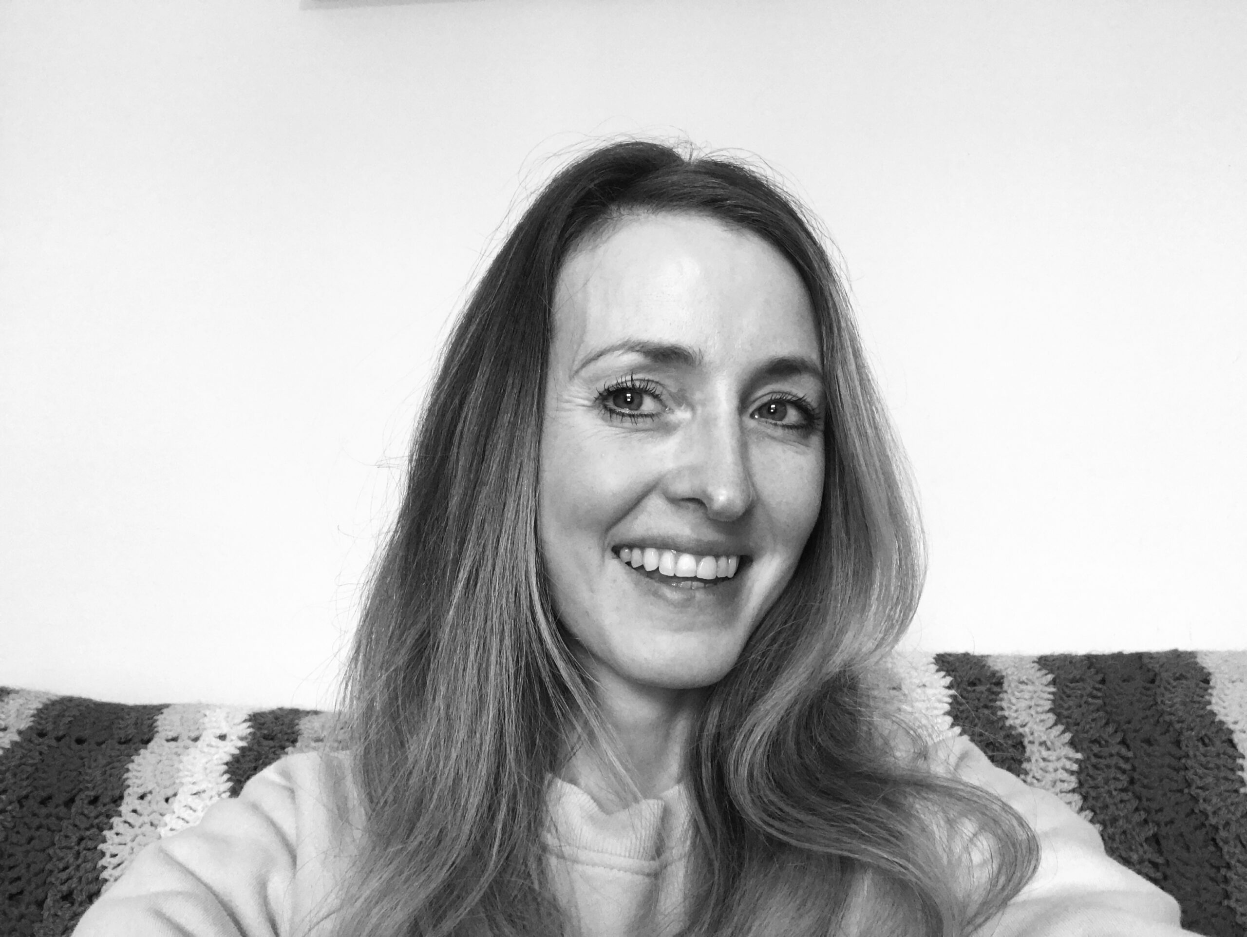 Roli counsellor smiling black and white